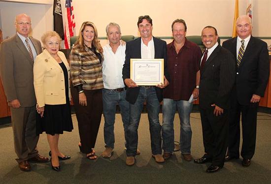 The Monmouth County Board of Chosen Freeholders presented a certificate to members of the band After The Reign for winning the statewide Stronger than the Storm song contest. Pictured left to right: Freeholder Gary J. Rich, Sr., Freeholder Lillian G. Burry, Freeholder Deputy Director Serena DiMaso, After The Reign members Bob Grado, Dave Burlett and John Strevens, Freeholder Director Thomas A. Arnone and Freeholder John P. Curley.